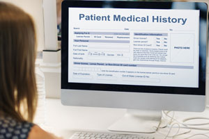 A computer screen showing the words "Patient Medical History"